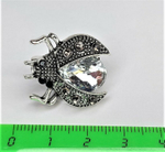 Брошь. Украшение  брошка "Жук" с белыми стразом . Символом перерождения, начала новой жизни.