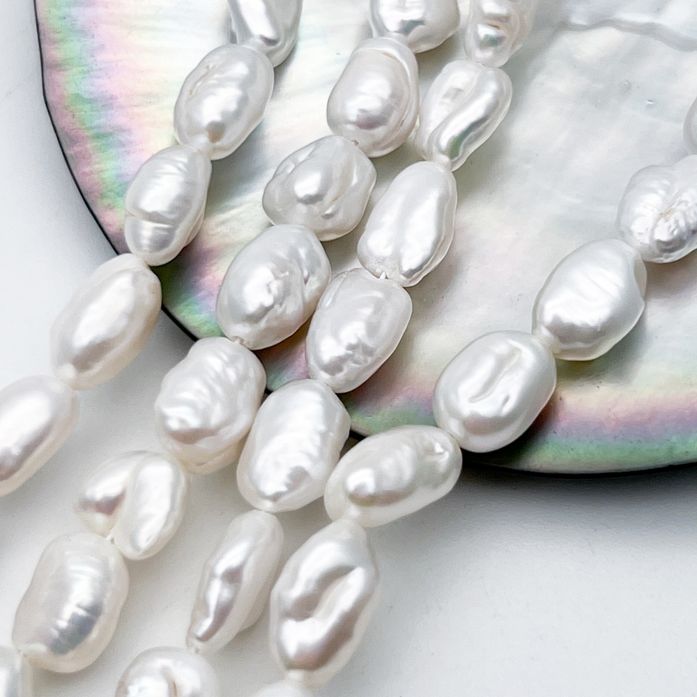 Жемчуг бусины, размер около 10-11 мм, цена за 9 шт (1/4 нити)