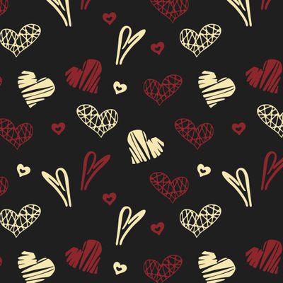 красные и кремовые сердечки на черном фоне