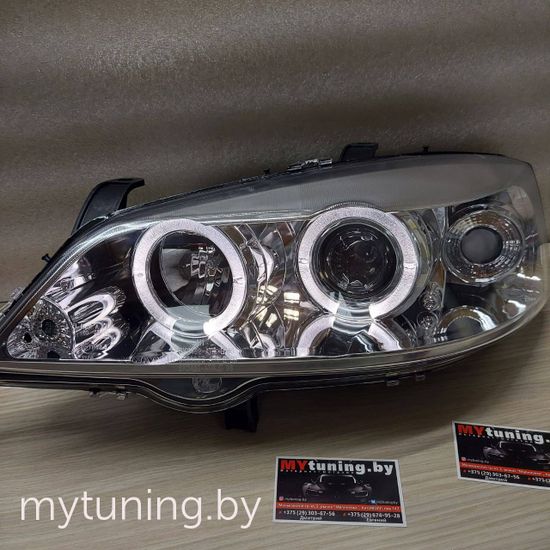 Передние фары Opel Astra G angel eyes chrome