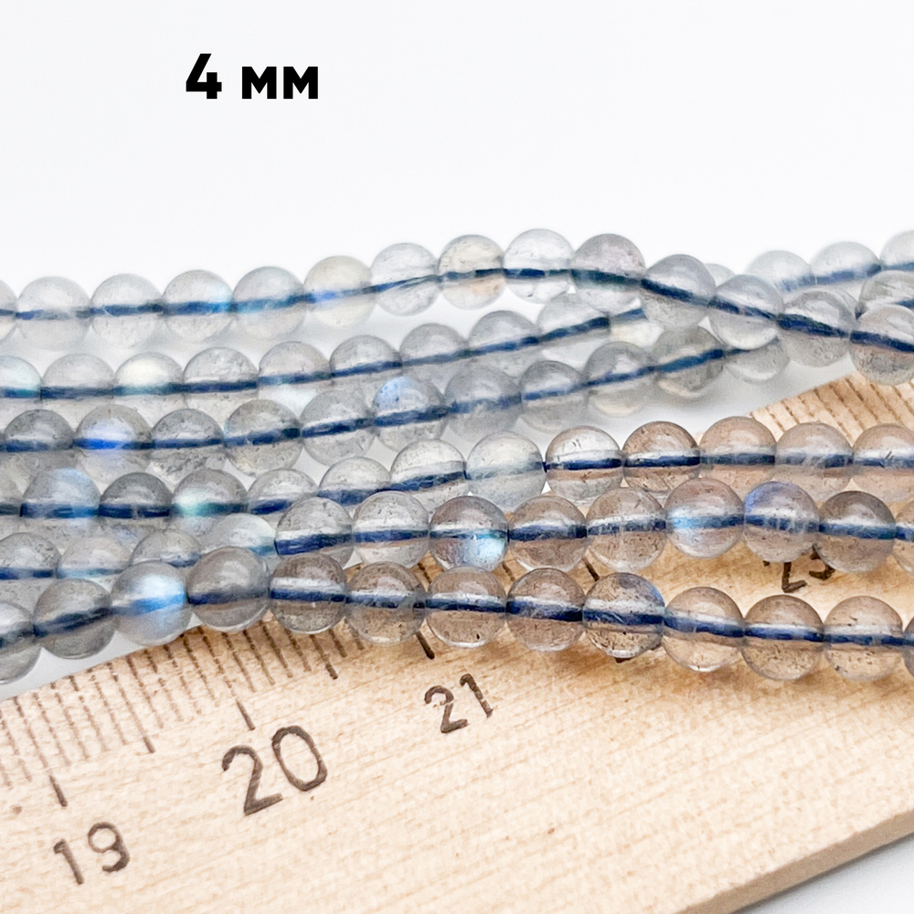 Лабрадор бусины, диаметр около 4,3 мм, цена за отрезок 19 см (1/2 нити)