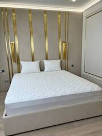 Наматрасник INVA защитный стеганный непромокаемый с бортиком 150 х 210 см / белый