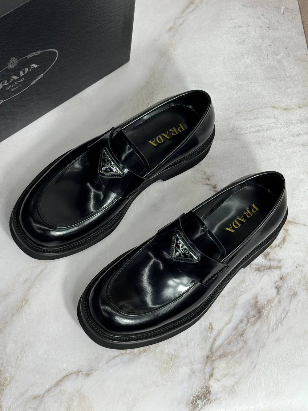 Лоферы Prada