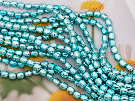 Нить гематитовых бусин с покрытием, "Stones", галтовка 6-7мм (уценка)