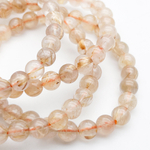 Кварц рутиловый бусины, диаметр около 7-7,3 мм, цена за 13 шт (1/4 нити)