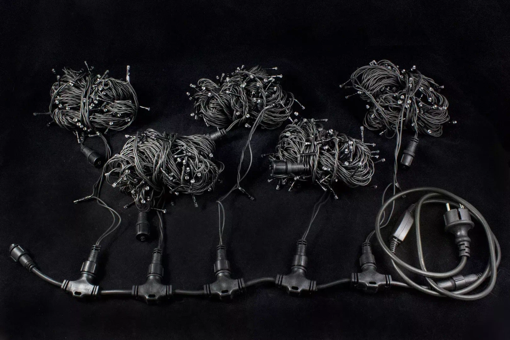 Гирлянда на дерево 5*20 м., 220V, 665 теплых белых LED ламп, черный каучук, Winner Light (ww.07.7B.665*5+)