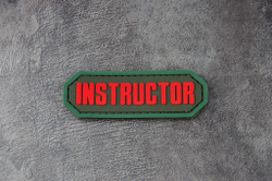 Шеврон Instructor PVC. Красный на оливе