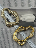 Декоративный пришивной элемент золотистый неровной формы