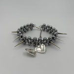 sharp medallion necklace