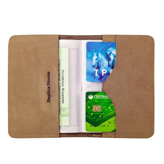 Фотография обложки для паспорта из нубука светло коричневого цвета в развернутом виде с наполнением на белом фоне.