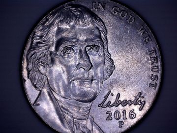 Монета под микроскопом - Монета 25 центов (аверс)