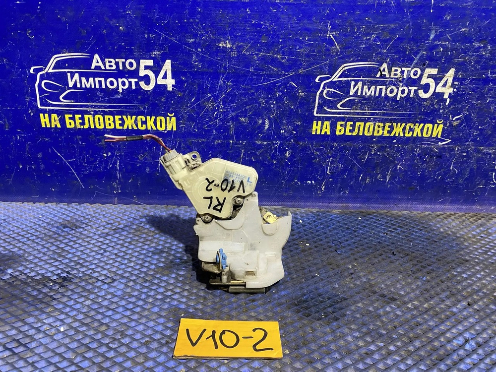 Замок двери задней левой NISSAN TINO 2001