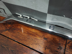 Накладка крышки багажника Geely Tugella 19-нв Б/У Оригинал 5062040200