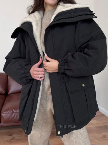 Черная женская куртка трансформер