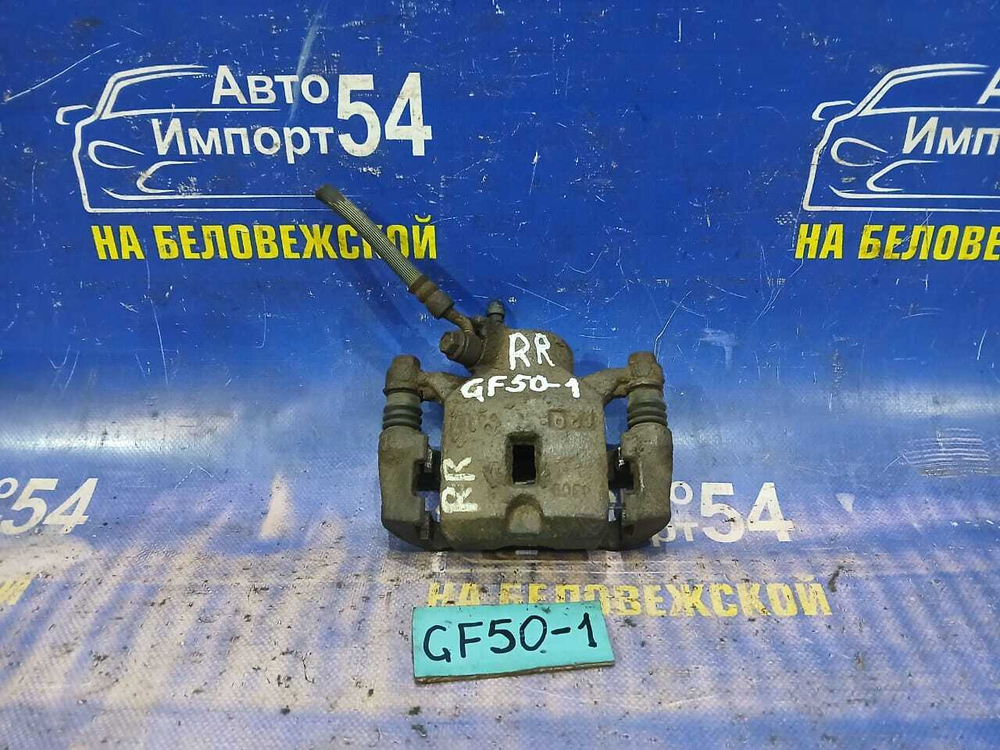Суппорт тормозной задний правый NISSAN CIMA 2002