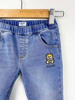 Джинсы Moschino