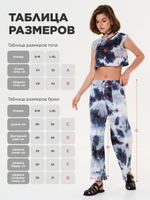 Женский брючный костюм в рубчик