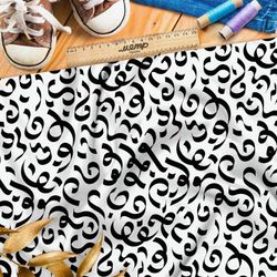 Ткань интерлок крупные каллиграфические узоры на бежевом фоне