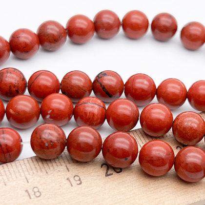 Яшма красная бусины, диаметр около 8,5-8,7 мм, цена за 21-22 шт (1/2 нити)