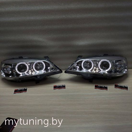 Передние фары Opel Astra G angel eyes chrome