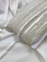 Тесьма кант жемчуг  на атласе