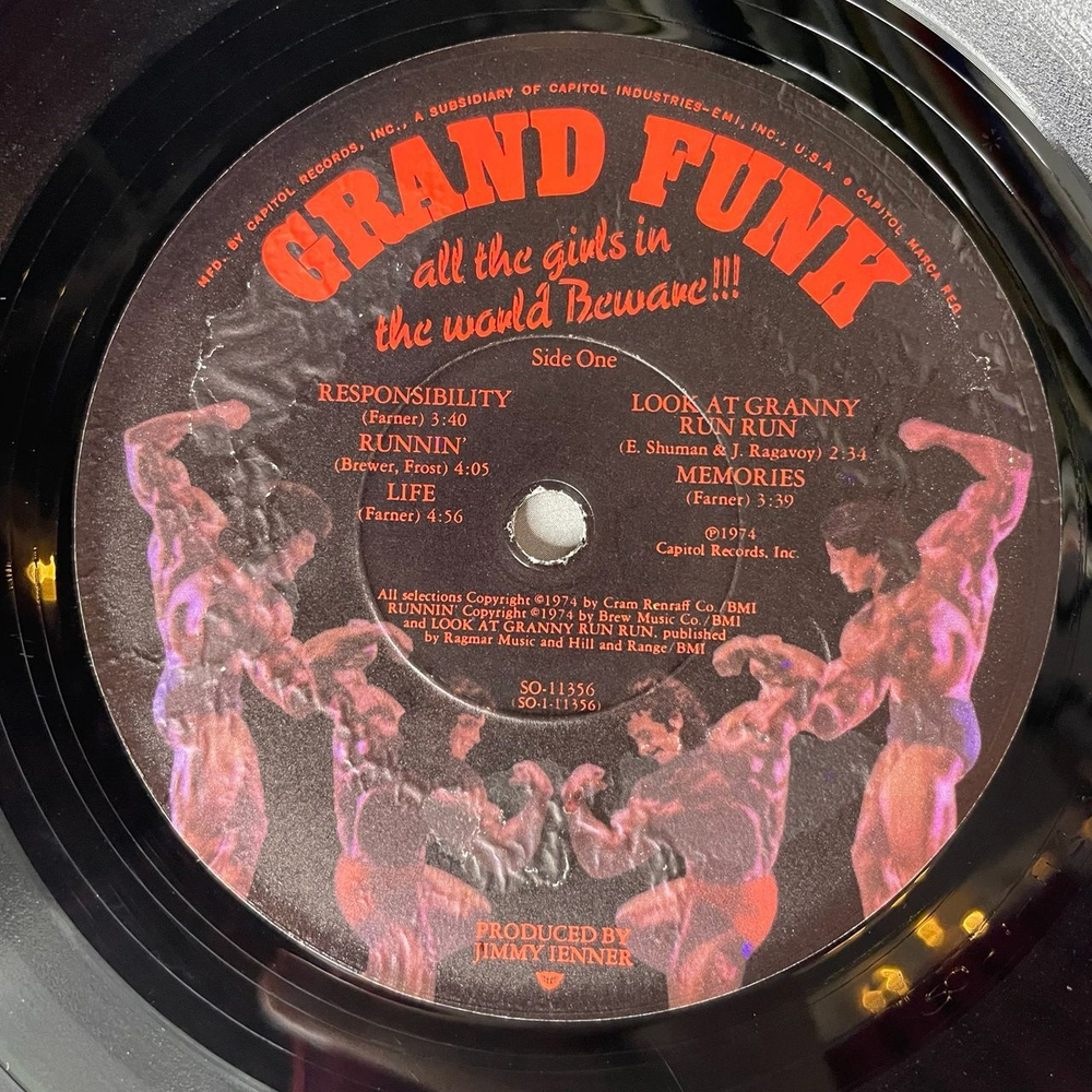 Винтажная виниловая пластинка LP Grand Funk All The Girls In The World Beware (USA 1974)