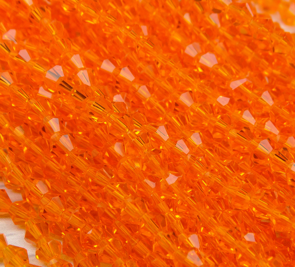 ББ007НН4 Хрустальные бусины "биконус", цвет: оранжевый прозрачный, размер 4 мм, кол-во: 95-100 шт.