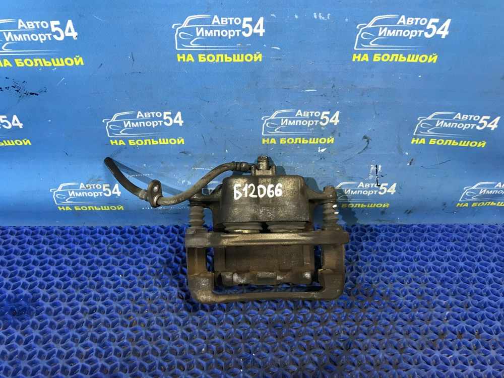 Суппорт тормозной передний левый Honda ELYSION 2006-2013