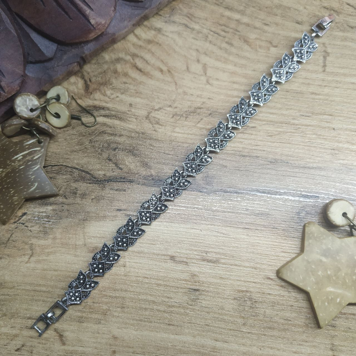 Браслет Vogue 2 Треугольник с листочками точки выпуклые металл серебристый