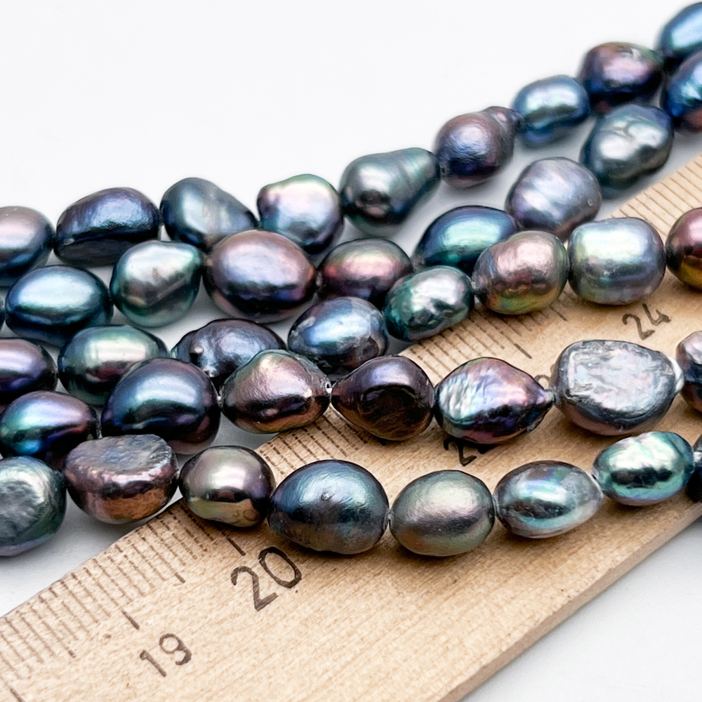 Жемчуг бусины, цвет темно-серый АВ, размер около 8-9*7-7,5 мм, цена за отрезок 17 см (1/2 нити)