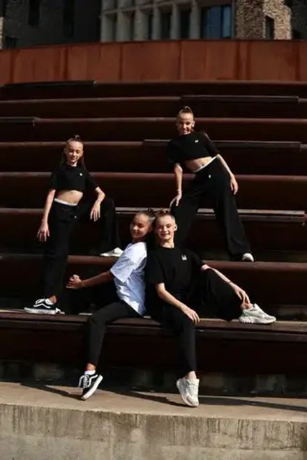 Брюки палаццо с белыми вставками для девочки