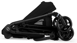 Прогулочная коляска Cybex Melio Carbon New Magic Black с дождевиком