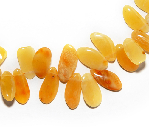 Бусы из цельного янтаря с молочными переливами 50 см, бусины да 2 см в длину