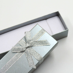 Картонный футляр «Конфетти» с бантиком для подарочного комплекта