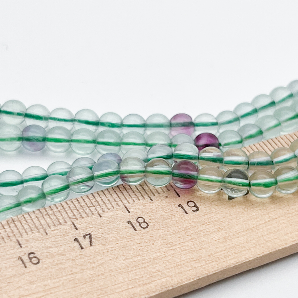 Флюорит бусины, диаметр 5-5,2 мм, цена за отрезок 19 см (1/2 нити)