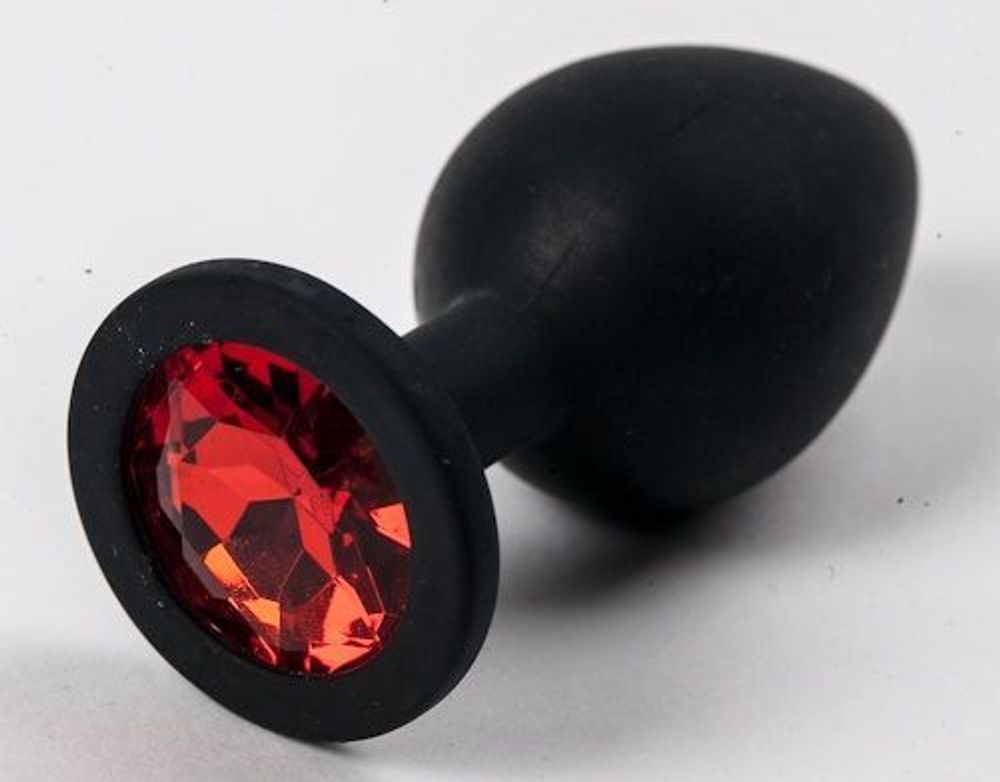 Черная силиконовая анальная пробка с красным стразом - 8,2 см.