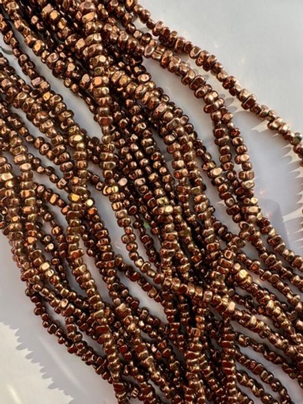 Нить гематитовых бусин 5-6мм, галтовка