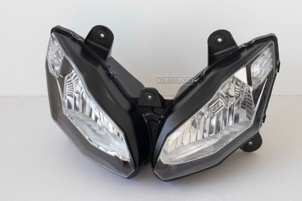 23007-0173. LENS-COMP,HEAD LAMP. Headlight ER6F, EX650, Ninja650 2012-2016