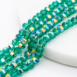 Бусины стекло, цвет изумрудный АВ, размер 4,5*6 мм, цена за отрезок 19 см (1/2 нити)