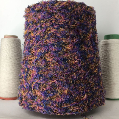 COTTON PELUCHE; 95% хлопок, 5% п/а; 260м/100 гр; цвет: На черной нити фиолетовые, синие и светло-коричневые хвостики;