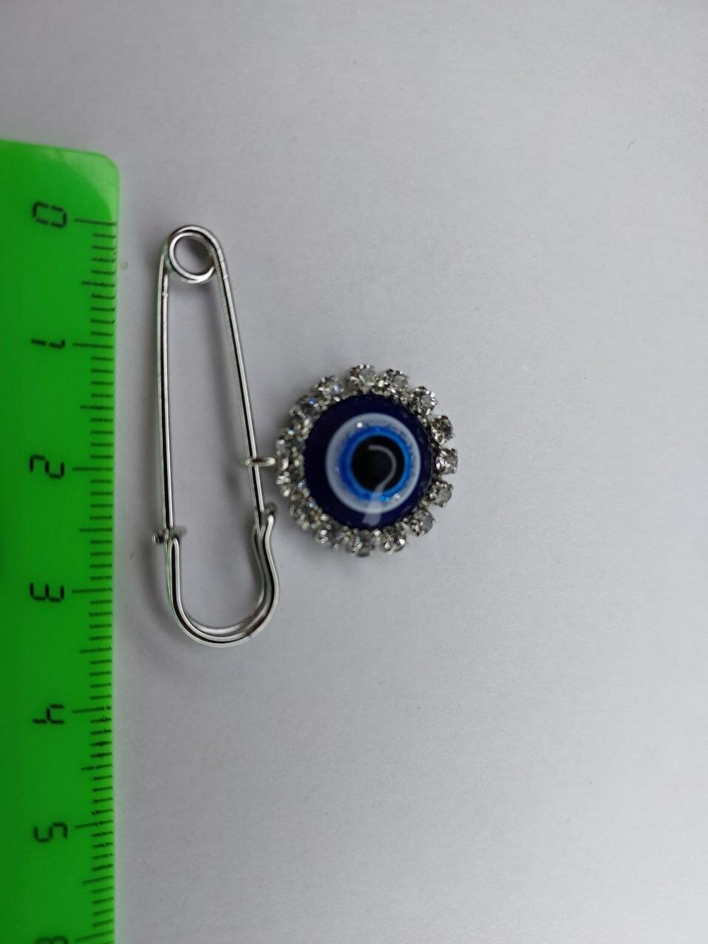 Брошь-булавка "Глаз Фатимы". цвет " Серебро"