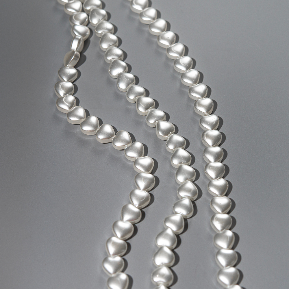 Хрустальный жемчуг в форме сердечек, белый 7,8*8,4мм