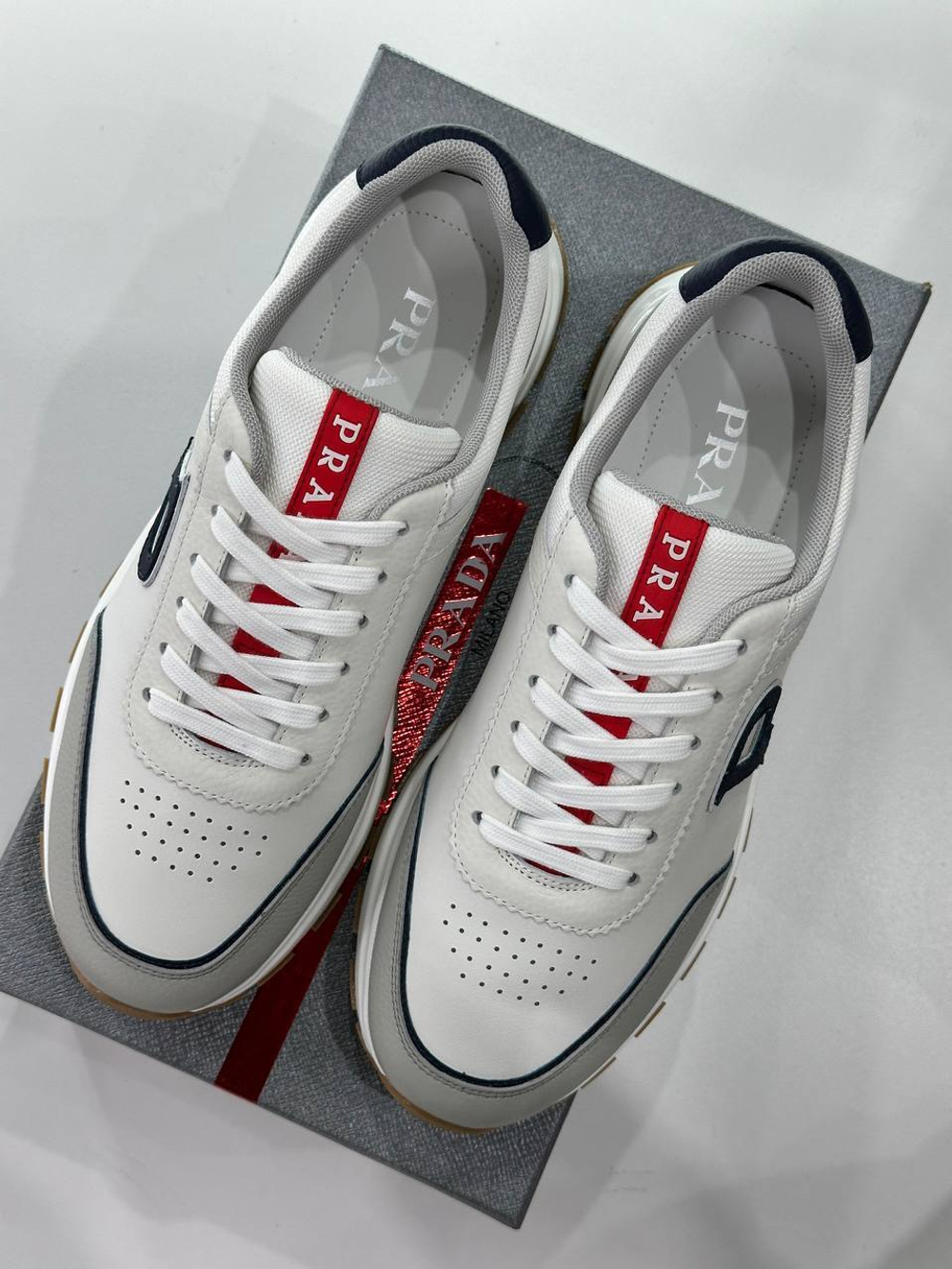 Кроссовки Prada