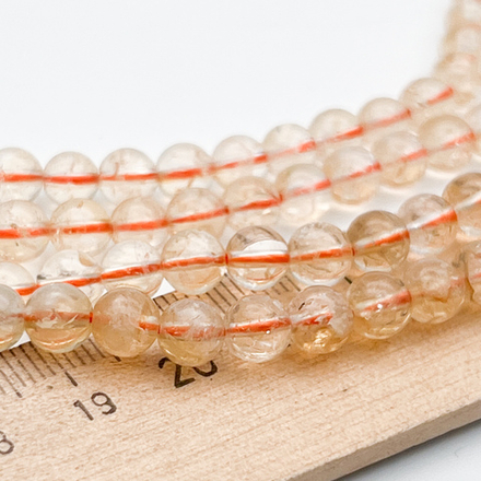 "Цитрин" бусины, диаметр 6,4-6,6 мм, цена за 28-29 шт (1/2 нити)