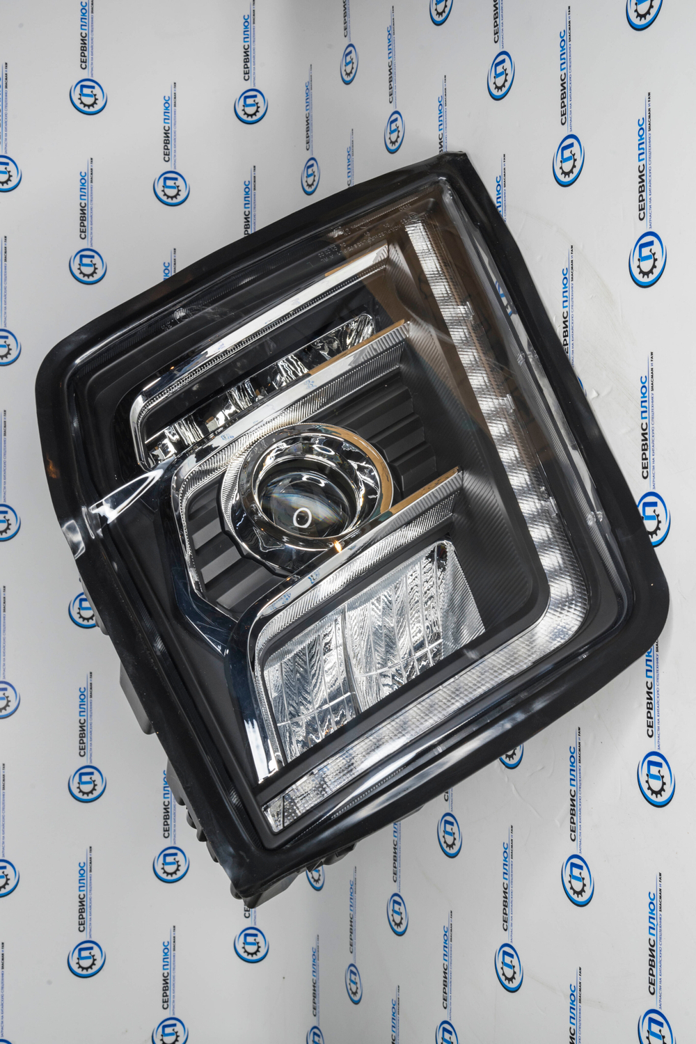 Фара передняя левая SHACMAN X5000 Тягач DZ97189723351