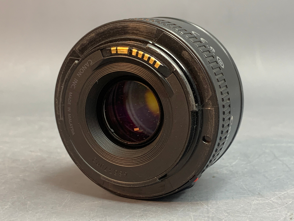 Canon 50mm 1.8 II внутри пылинки
