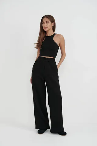 Утепленные брюки клеш черного цвета