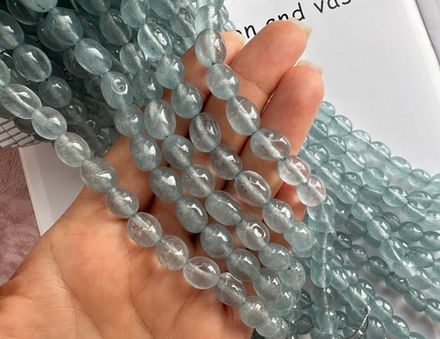 Нить бусин из тонированного кварца 8-9мм (галтовка)