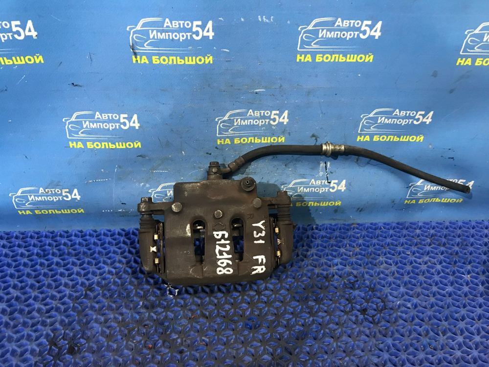 Суппорт тормозной передний правый NISSAN CEDRIC 1999-2005