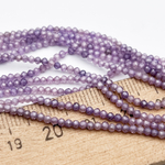 Фианит бусины (кубический цирконий), цвет лиловый, размер около 2 мм, цена за нить 38 см